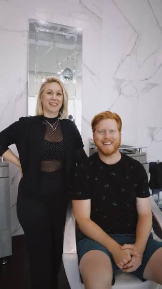 Kasey with a guest in the beauty studio