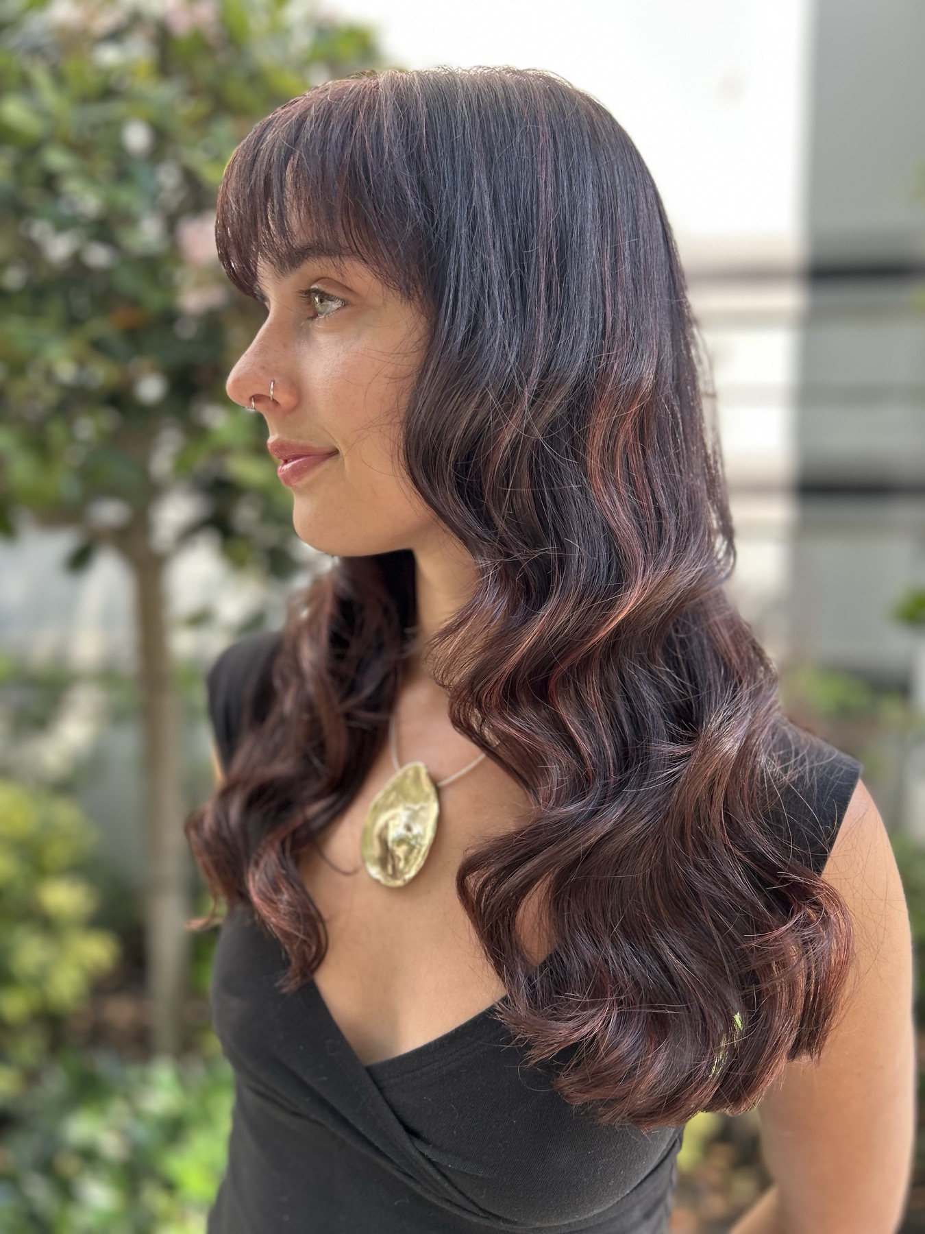 Dark brunette waves with soft bangs